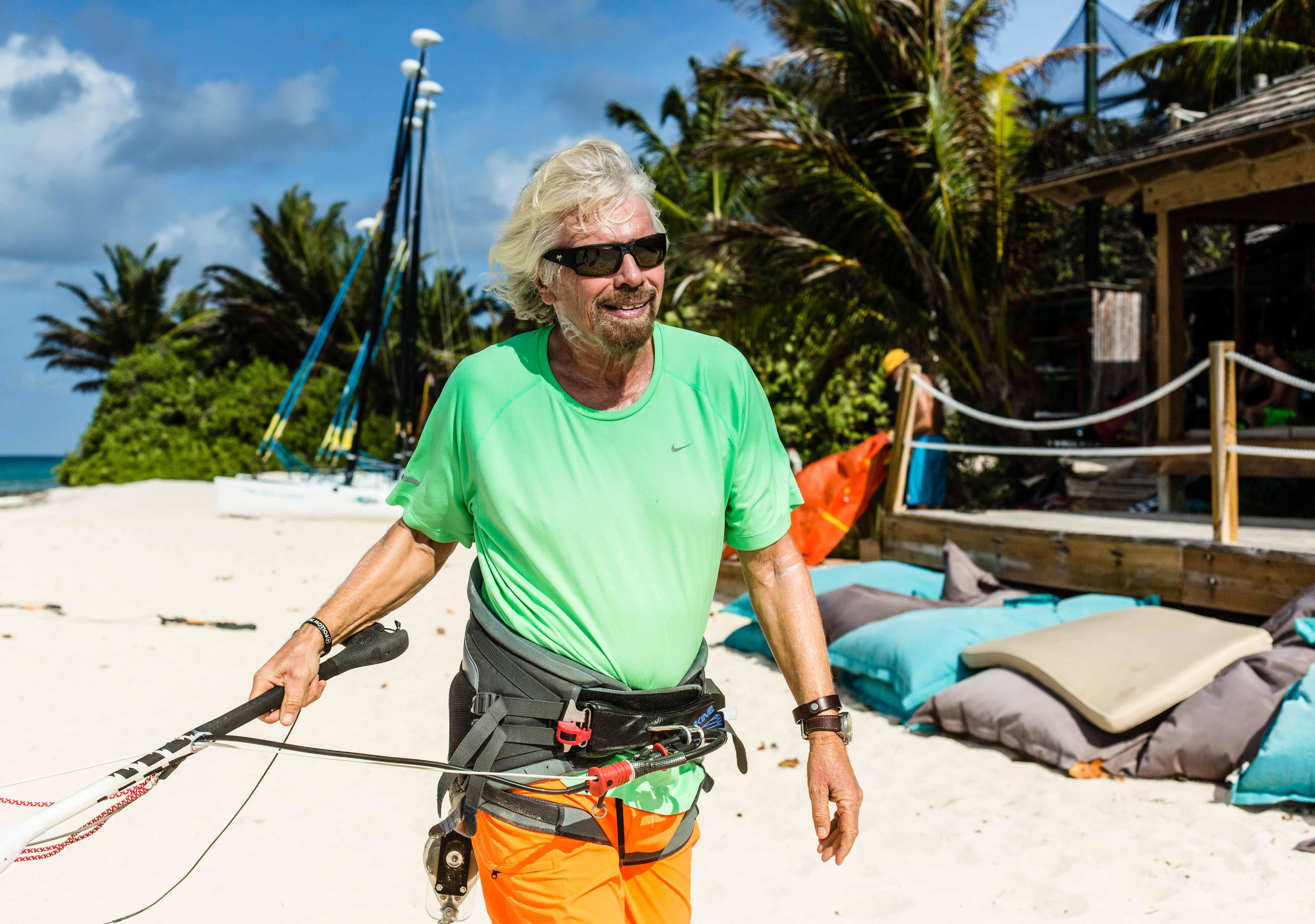 Richard Branson gets ready to kiteboard around his private island.jpg