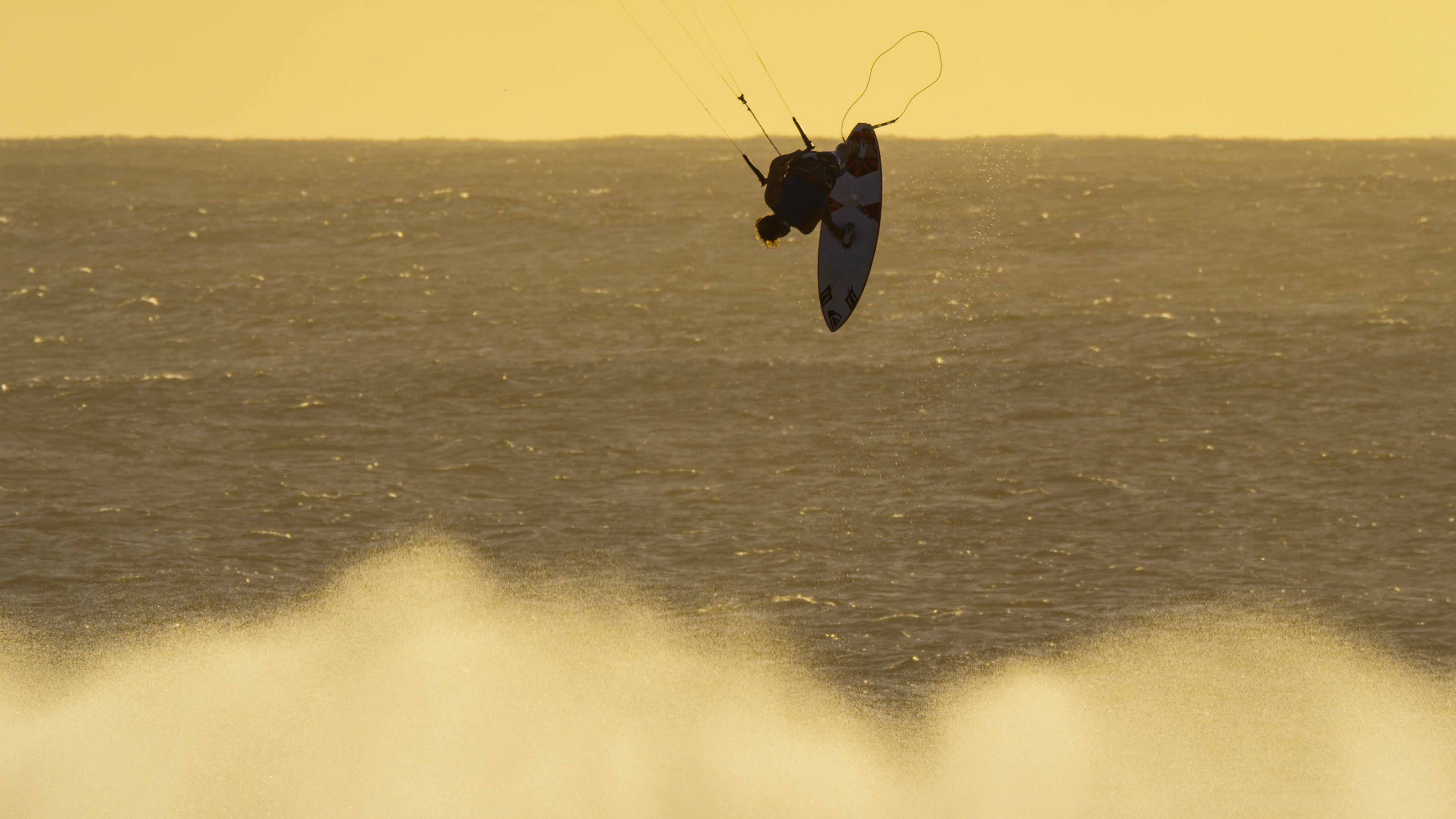 Windsurfing legend and kiteboarding pioneer Robby Naish scores at cloudbreak, fiji.jpg